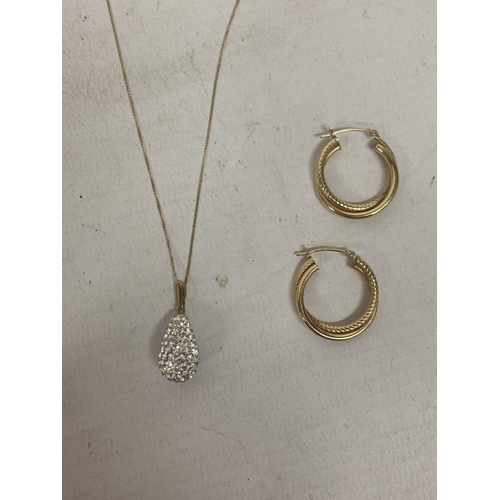 504 - THREE MARKED 9 CARAT GOLD ITEMS TO INCLUDE A PAIR OF HOOP EARRINGS AND A NECKLACE WITH CRYSTAL DROP ... 