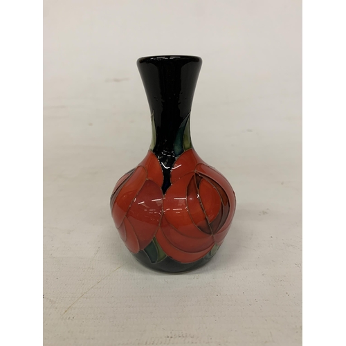 710 - A MOORCROFT 4 INCH RED ROSE VASE