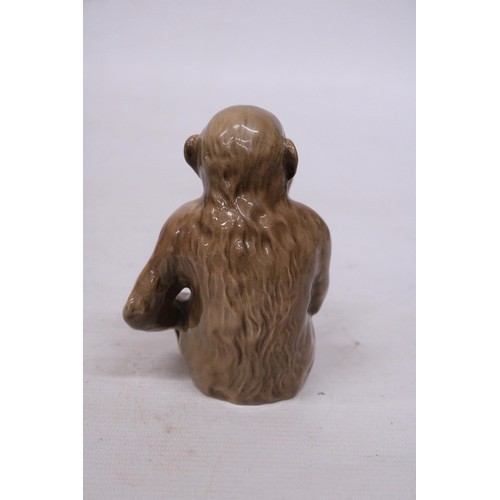 739 - A BESWICK MONKEY WITH A PIPE NO. 1049