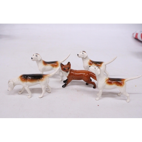 741 - A BESWICK FOX WITH FOUR FOXHOUNDS