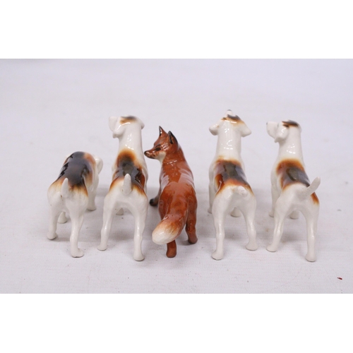 741 - A BESWICK FOX WITH FOUR FOXHOUNDS