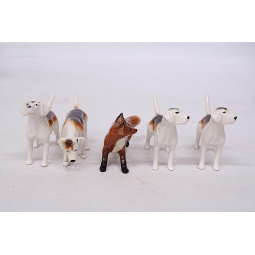 741 - A BESWICK FOX WITH FOUR FOXHOUNDS