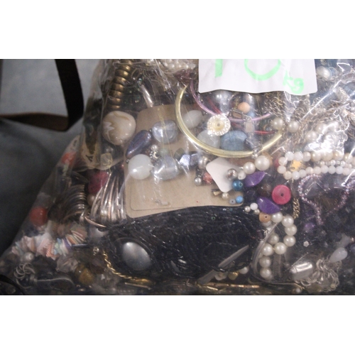 820 - A 10KG BAG OF COSTUME JEWELLERY