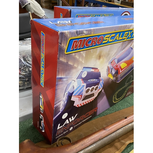 825A - A BOXED MICRO SCALEXTRIC (LAW ENFORCER)