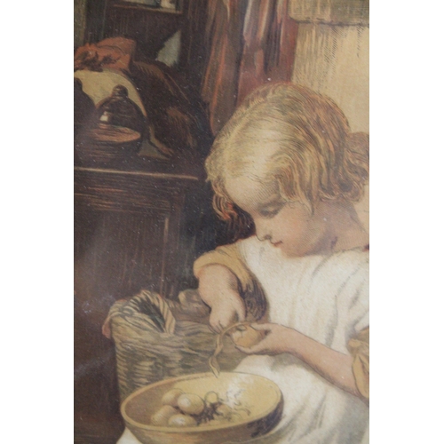 853 - A FRAMED PRINT OF A YOUNG GIRL IN A KITCHEN PEELING POTATOES WITH A CAT