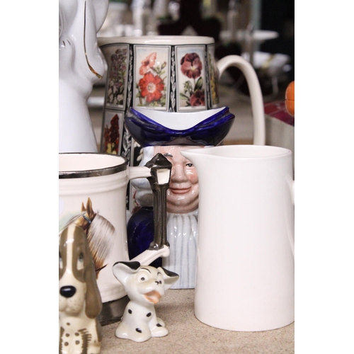 976 - A QUANTITY OF CERAMICS TO INCLUDE TOBY JUGS, JUGS, A 101 DALMATIONS PHOTO FRAME, ANIMAL FIGURES, ETC