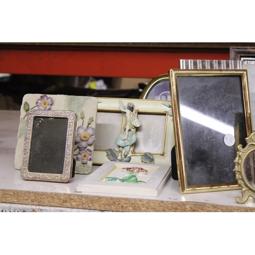 1033 - A LARGE QUANTITY OF DIFFERENT STYLES OF PHOTO FRAMES