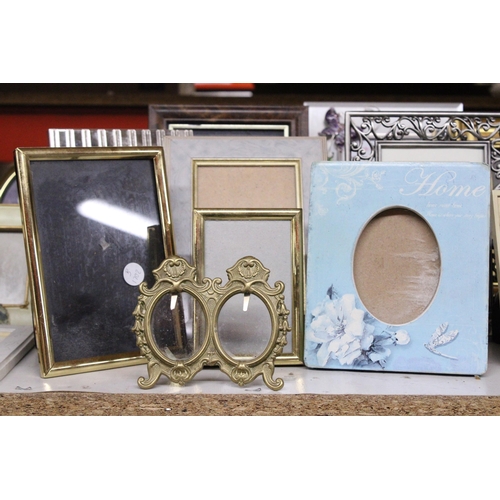 1033 - A LARGE QUANTITY OF DIFFERENT STYLES OF PHOTO FRAMES