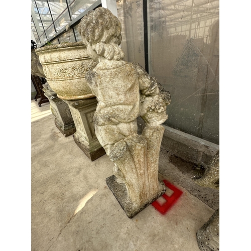 1510 - A CONCRETE GARDEN FIGURE OF A YOUNG BOY CARRYING A BASKET (H:75CM)