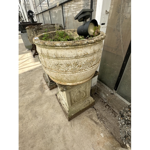 1511 - A CONCRETE CIRCULAR PLANTER ON AN UNRELATED CONCRETE PEDESTAL BASE