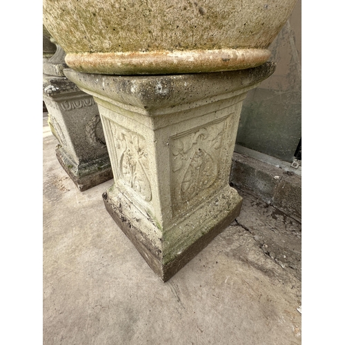 1511 - A CONCRETE CIRCULAR PLANTER ON AN UNRELATED CONCRETE PEDESTAL BASE