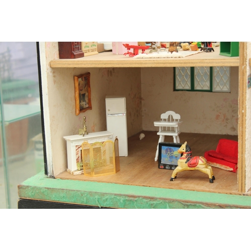 1712 - A LARGE DOLLS HOUSE WITH BASE, FULLY FURNISHED WITH DETACHABLE ROOF AND FRONT PANEL