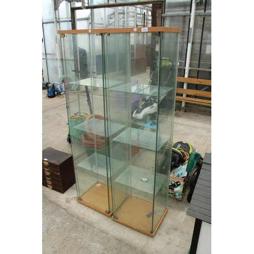 1713 - A PAIR OF GLASS DISPLAY CABINETS