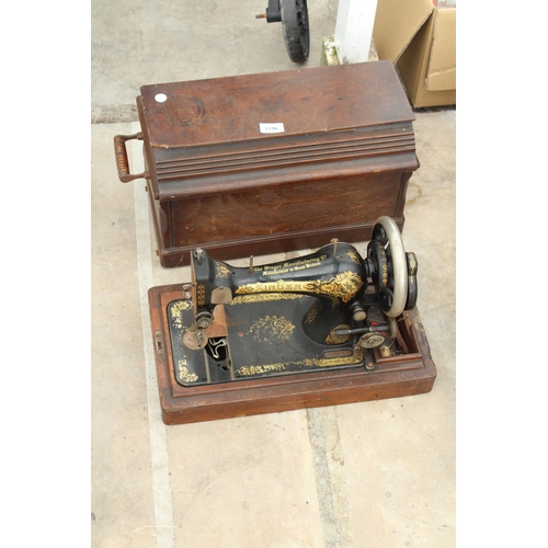 1796 - A VINTAGE SINGER SEWING MACHINE WITH WOODEN CARRY CASE