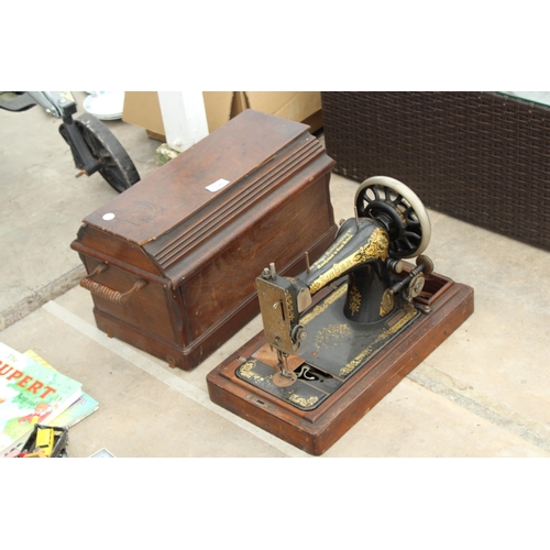 1796 - A VINTAGE SINGER SEWING MACHINE WITH WOODEN CARRY CASE