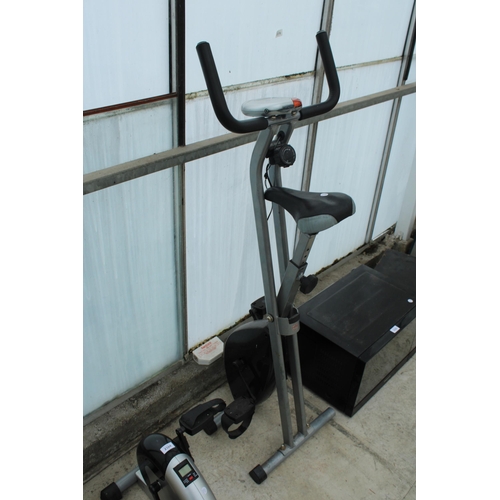 2324 - A FOLDING EXERCISE BIKE AND A FOOT PEDAL MACHINE