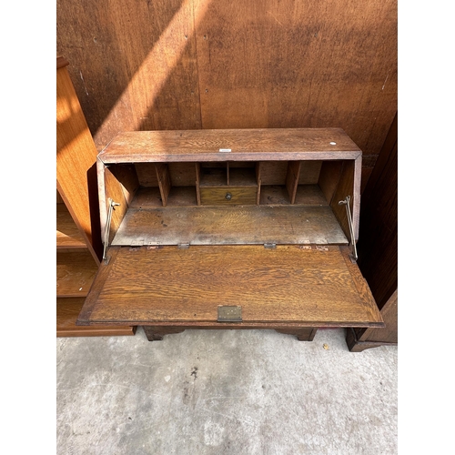 2524 - A MID 20TH CENTURY OAK BUREAU, 34