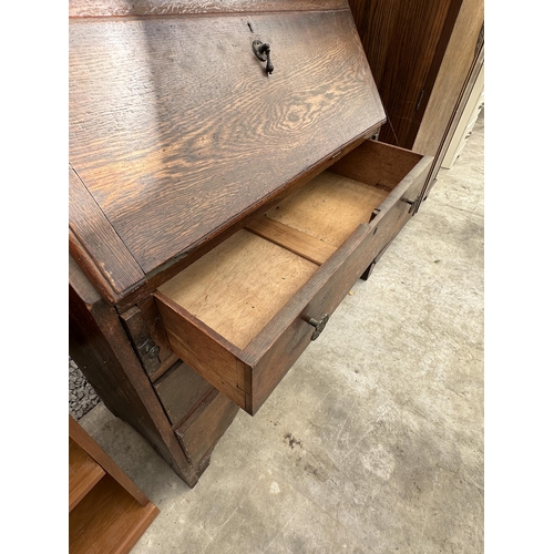 2524 - A MID 20TH CENTURY OAK BUREAU, 34