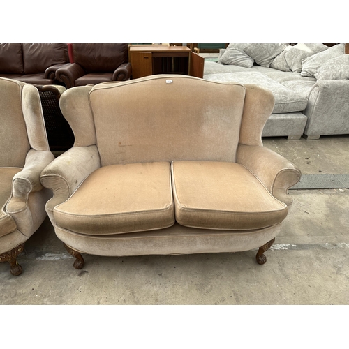 2533 - A 19TH CENTURY STYLE CURVED FRONT TWO SEATER WINGED SETTEE AND CHAIR ON CABRIOLE LEGS PARTLY PAINTED... 