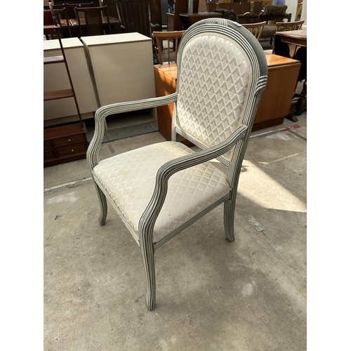 2556 - A CONTINENTAL STYLE OPEN ARM CHAIR