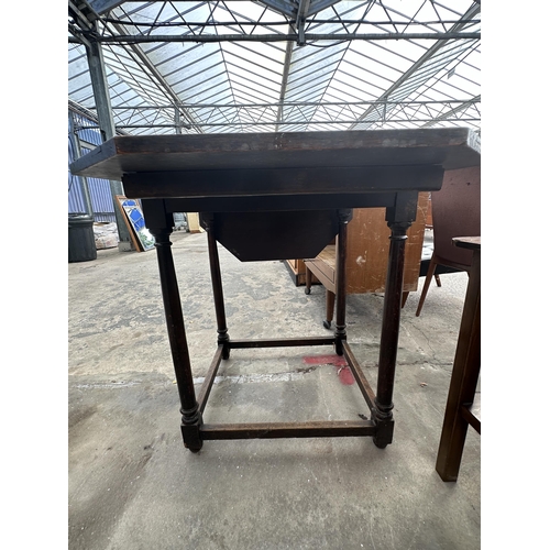 2568 - AN EARLY 20TH CENTURY OAK DROP-LEAF TABLE WITH CANTED CORNERS