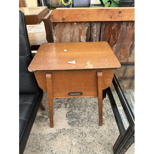 2591 - A MID 20TH CENTURY SEWING BOX/TABLE AND A BLACK VINLY BUTTONED LOUNGE CHAIR