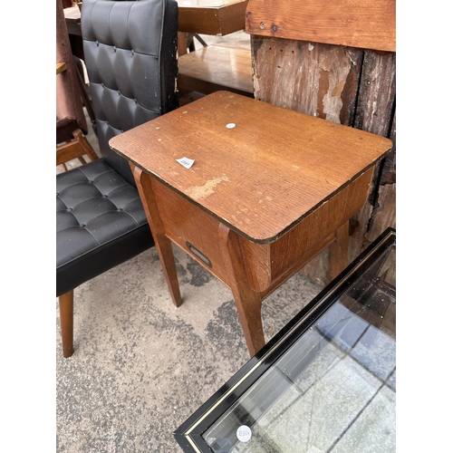 2591 - A MID 20TH CENTURY SEWING BOX/TABLE AND A BLACK VINLY BUTTONED LOUNGE CHAIR