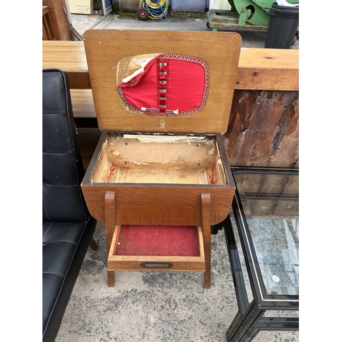 2591 - A MID 20TH CENTURY SEWING BOX/TABLE AND A BLACK VINLY BUTTONED LOUNGE CHAIR