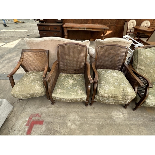 2620 - AN EARLY 20TH CENTURY BERGERE THREE PIECE SUITE AND A SIMILAR CHAIR