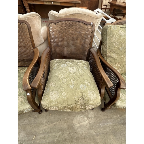 2620 - AN EARLY 20TH CENTURY BERGERE THREE PIECE SUITE AND A SIMILAR CHAIR