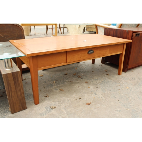 2651 - A HARDWOOD COFFEE TABLE WITH SINGLE PULL TROUGH DRAWER 48