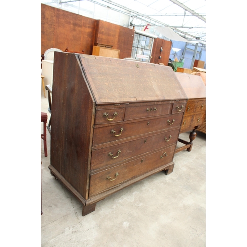 2675 - A GEORGE III OAK AND CROSSBANDED BUREAU WITH FITTED INTERIOR AND DRAWERS TO BASE, 42