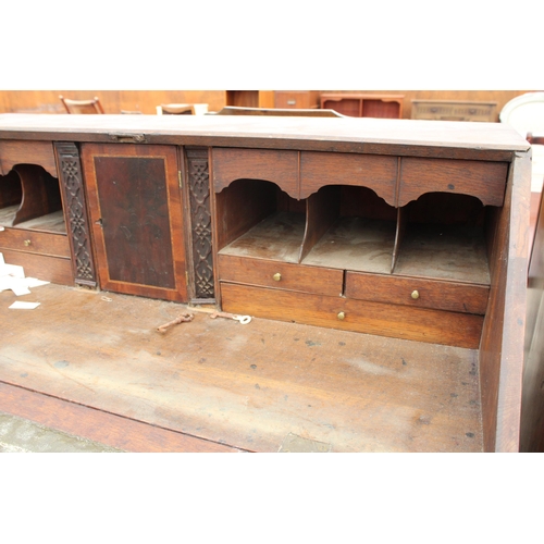 2675 - A GEORGE III OAK AND CROSSBANDED BUREAU WITH FITTED INTERIOR AND DRAWERS TO BASE, 42