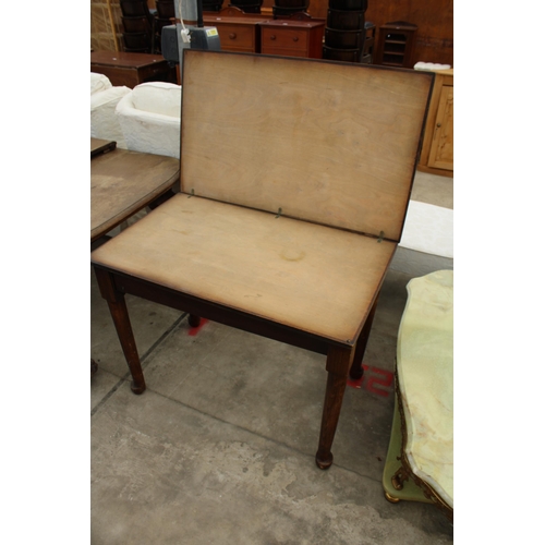 2682 - A MID 20TH CENTURY OAK AND BEECH FOLD-OVER WORK TABLE