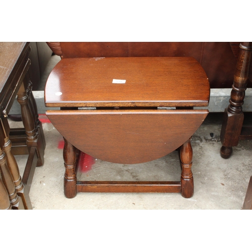 2691 - AN OAK SWIVEL TOP MINIATURE DROP-LEAF TABLE