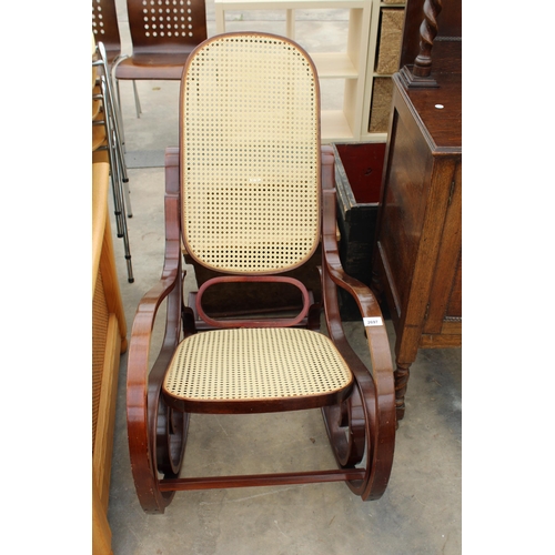 2697 - A BENTWOOD AND SPLIT CANE ROCKING CHAIR