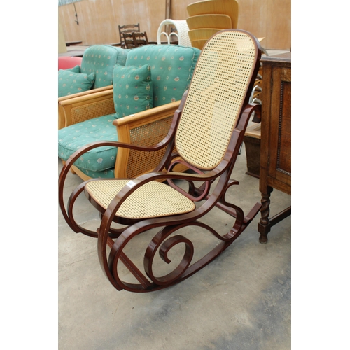 2697 - A BENTWOOD AND SPLIT CANE ROCKING CHAIR