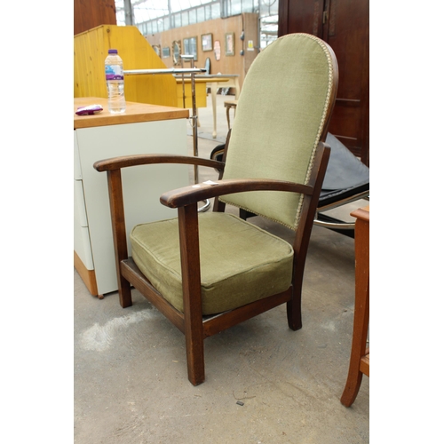 2717 - A BEECH FRAMED LOW FIRESIDE CHAIR