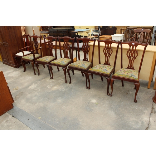 2737 - A SET OF SIX MAHOGANY CHIPPENDALE STYLE CHAIRS WITH PIERCED SPLAT BACKS ON CABRIOLE FRONT LEGS AND S... 