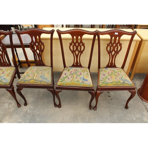 2737 - A SET OF SIX MAHOGANY CHIPPENDALE STYLE CHAIRS WITH PIERCED SPLAT BACKS ON CABRIOLE FRONT LEGS AND S... 