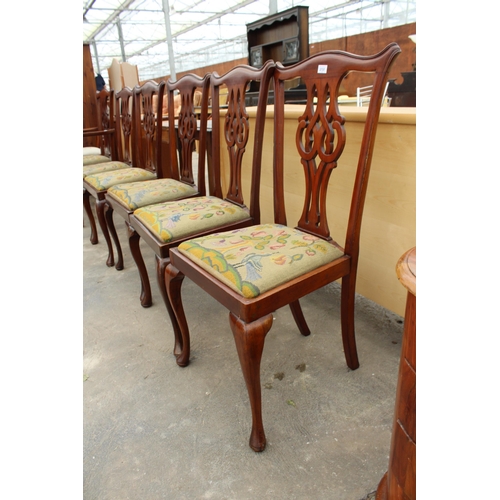 2737 - A SET OF SIX MAHOGANY CHIPPENDALE STYLE CHAIRS WITH PIERCED SPLAT BACKS ON CABRIOLE FRONT LEGS AND S... 