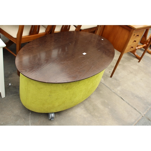 2753 - A MODERN OVAL COFFEE TABLE WITH LIFT-UP LID ENCLOSING STORAGE SECTION, 47