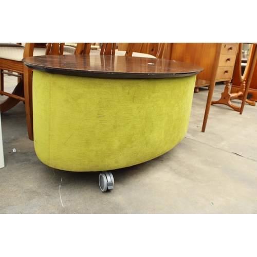 2753 - A MODERN OVAL COFFEE TABLE WITH LIFT-UP LID ENCLOSING STORAGE SECTION, 47