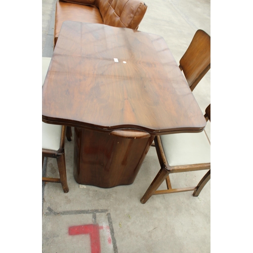 2778 - A WALNUT AND ART DECO DRAW-LEAF DINING TABLE AND FOUR CHAIRS