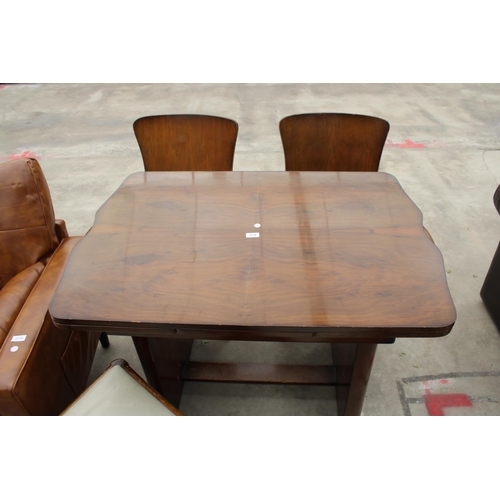 2778 - A WALNUT AND ART DECO DRAW-LEAF DINING TABLE AND FOUR CHAIRS