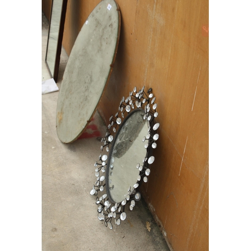 2800 - AN OVAL FRAMELESS WALL MIRROR AND 22