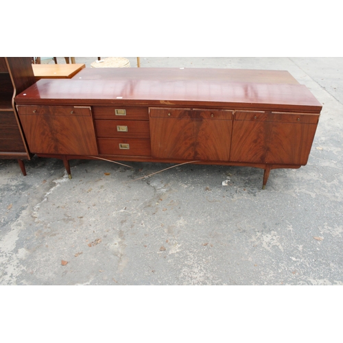 2820 - A RETRO MAHOGANY COCKTAIL SIDEBOARD ENCLOSING THREE DRAWERS, TWO CUPBOARDS AND FALL FRONT COCKTAIL S... 