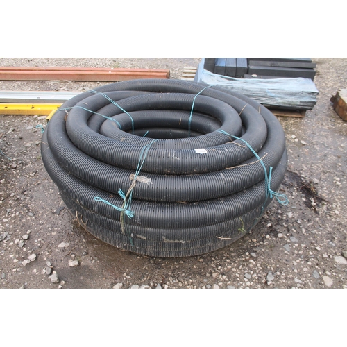 1084 - ROLL OF BLACK LAND DRAIN  4” DIAMETER NO VAT