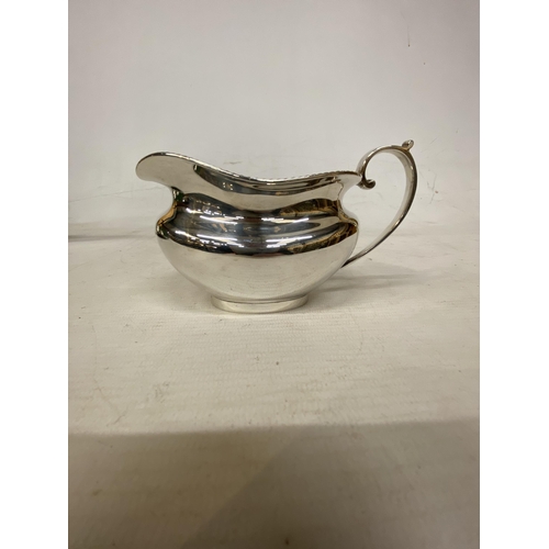 1 - A HALLMARKED LONDON TEASET COMPRISING OF A TEAPOT, SUGAR BASIN AND MILK JUG ON A HALLMARKED BIRMINGH... 