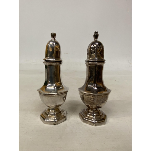 17 - A PAIR OF HALLMARKED LONDON SALT AND PEPPER POTS - APPROX - 94.5 G